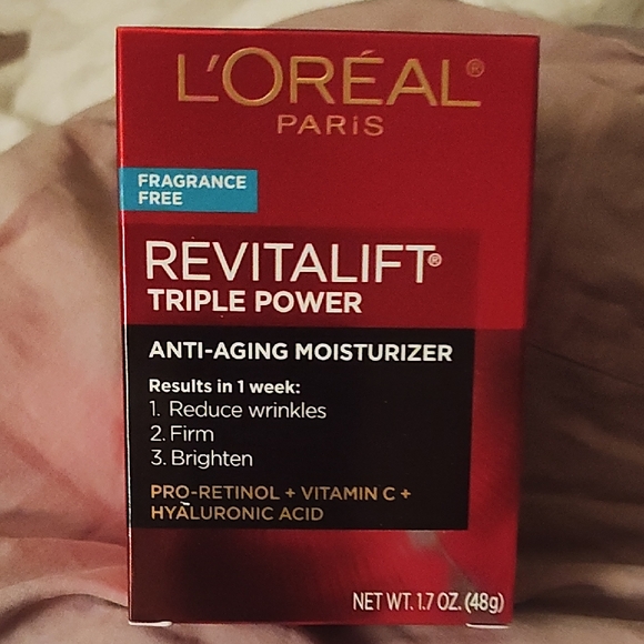 L'Oreal Other - L'Oreal Revitalift Triple Power Anti-Aging Moisturizer - Red